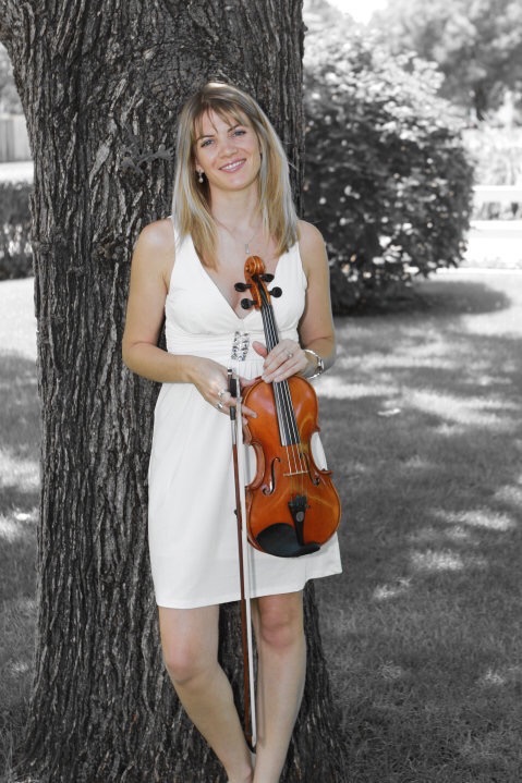 Ashley Rescot in white with acoustic violin